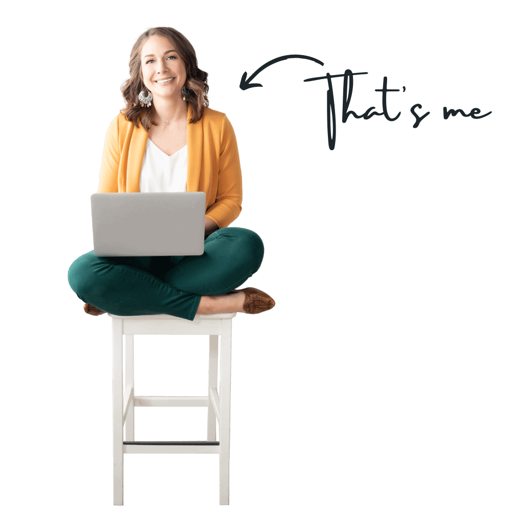 Image of a brown haired woman sitting cross legged on a stool with a laptop in her lap. An arrow pointing to her has text that reads "That's me."
